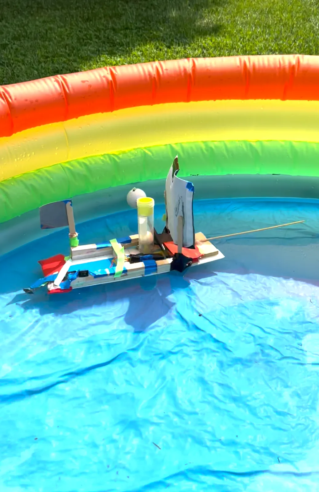 Float test: a scrap-built boat in the kiddie pool
