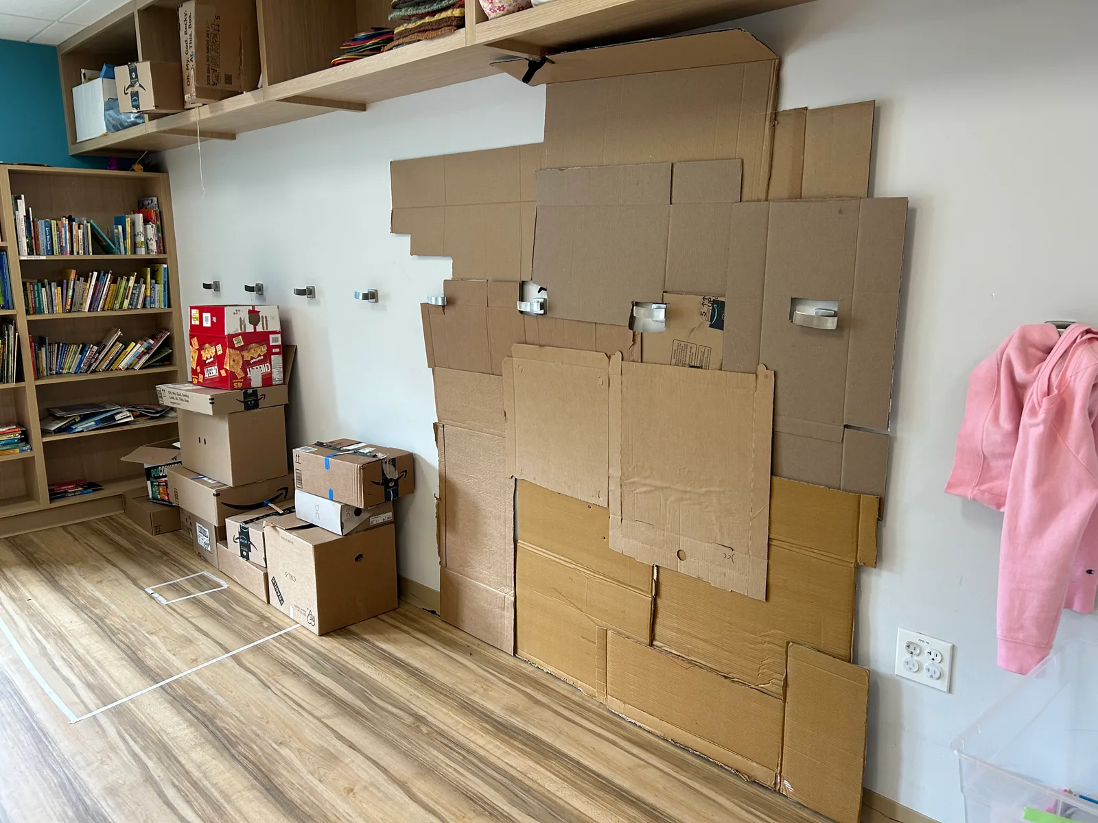 The cardboard rec wall going up