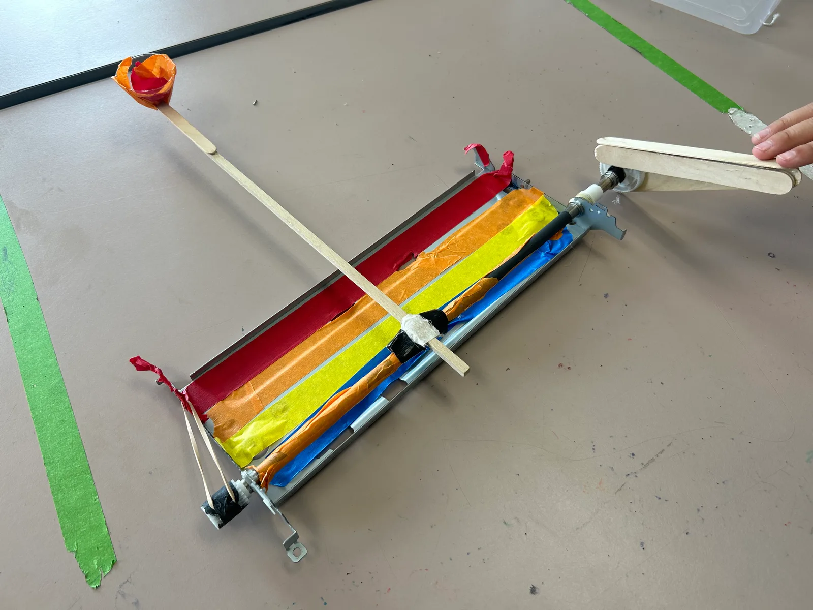 A tape-and-stick build in progress on the table