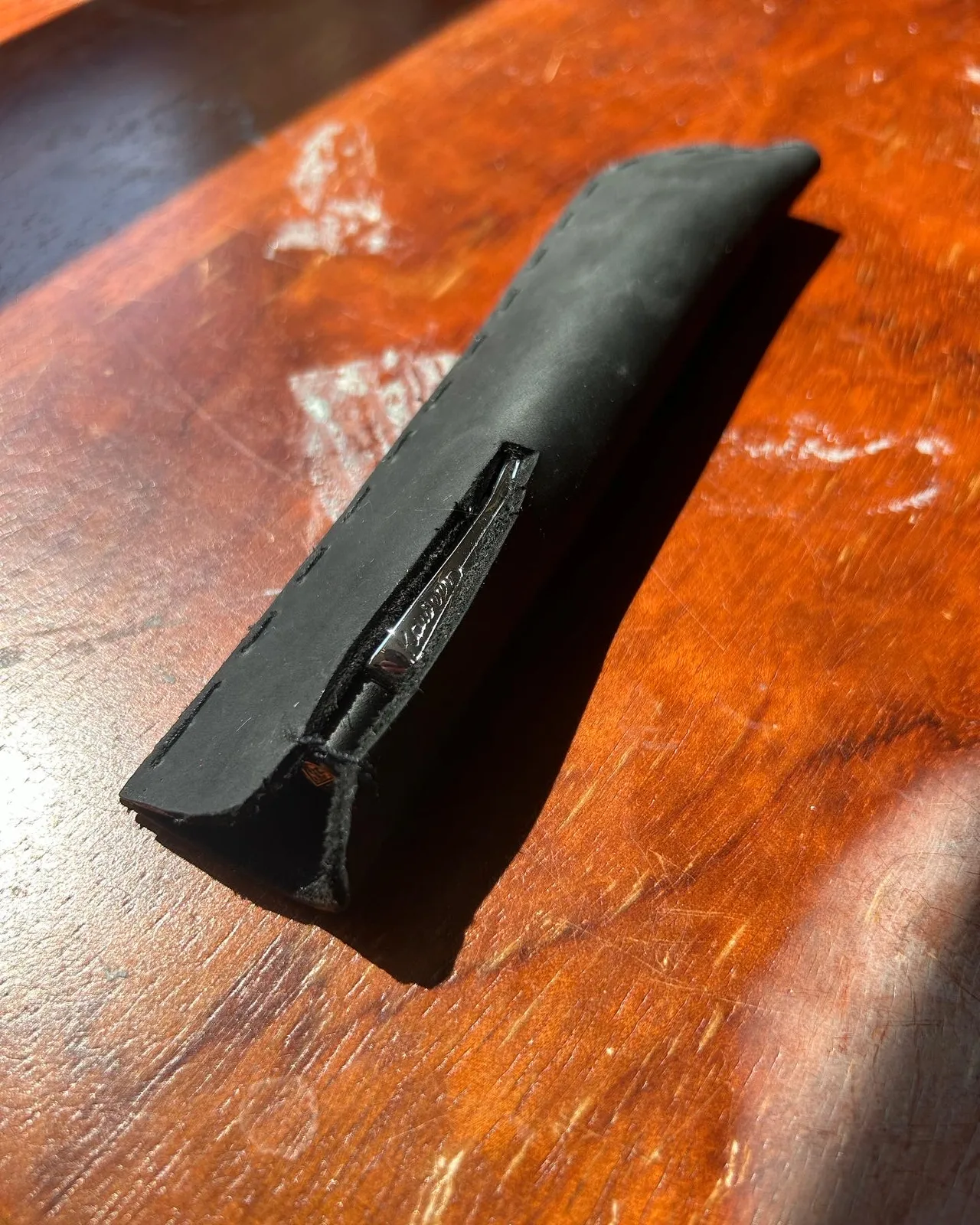 The slit opening, the part the next version would drop