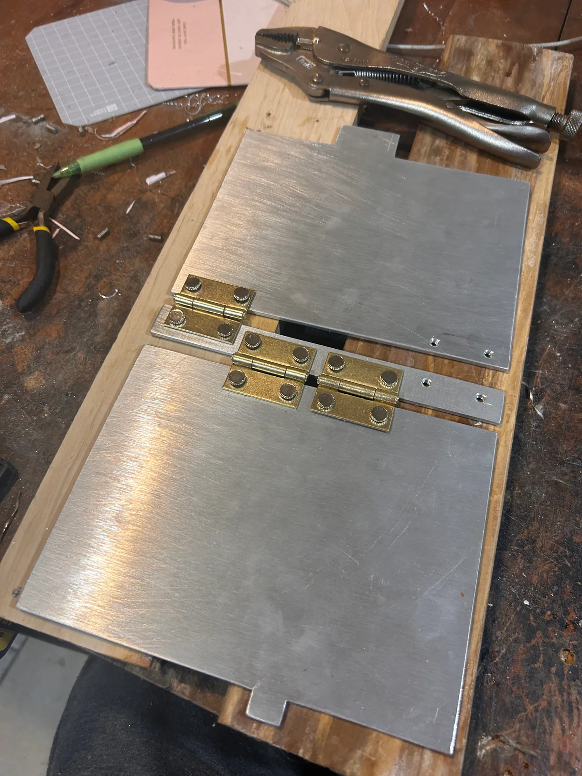 Hinges and lock fitted to the covers before assembly
