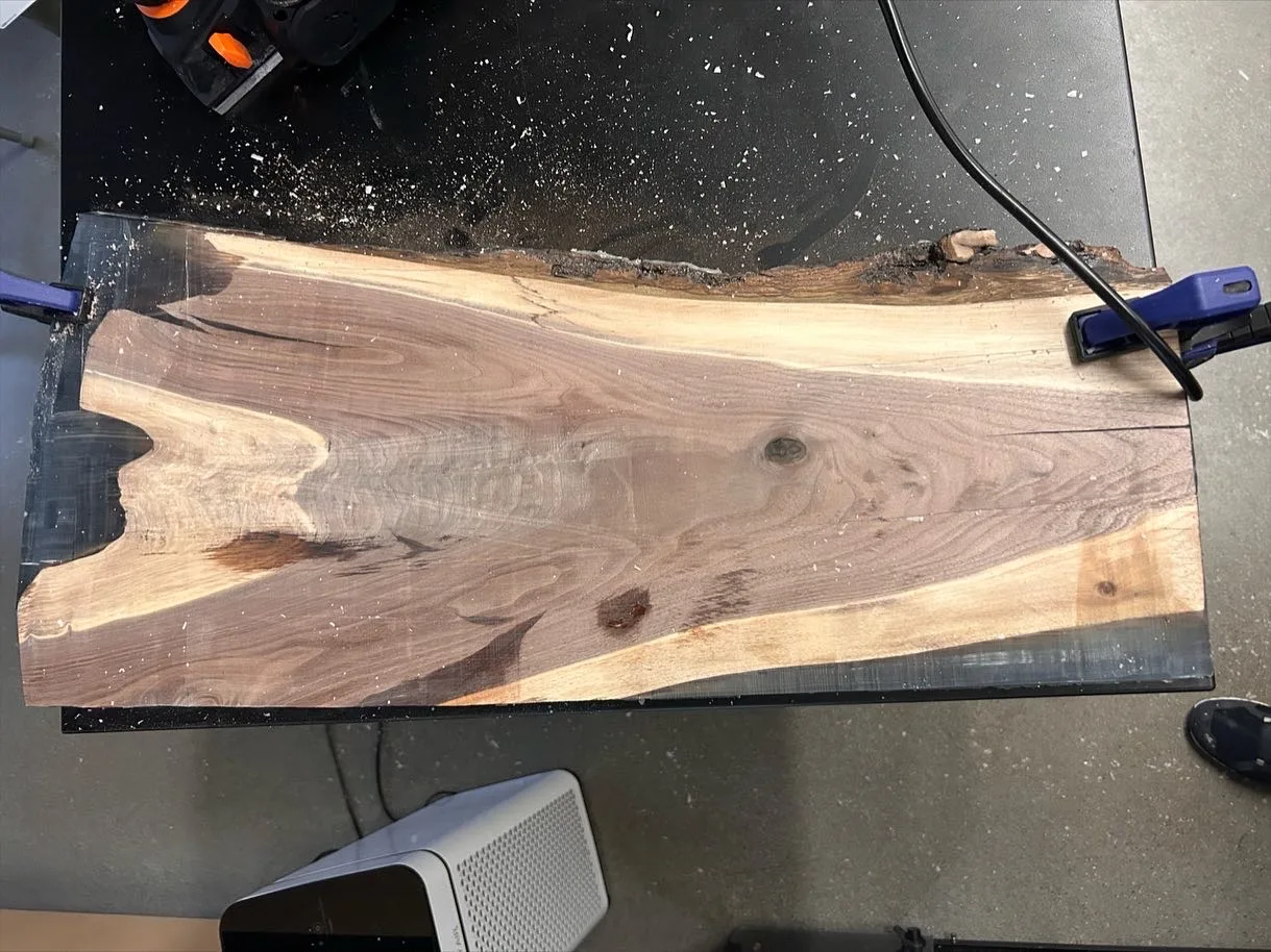 The slab clamped to the bench before flattening