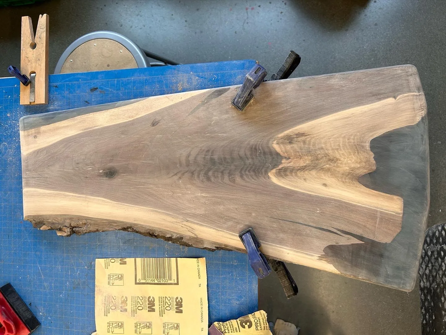Sanding the flattened slab