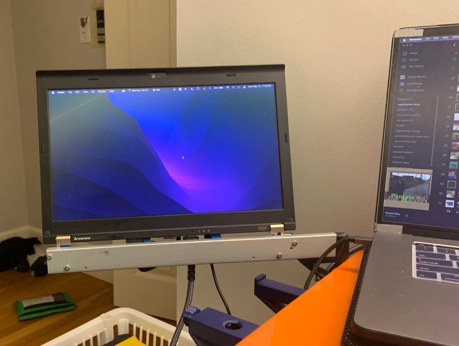 In use as a file viewer next to the main laptop
