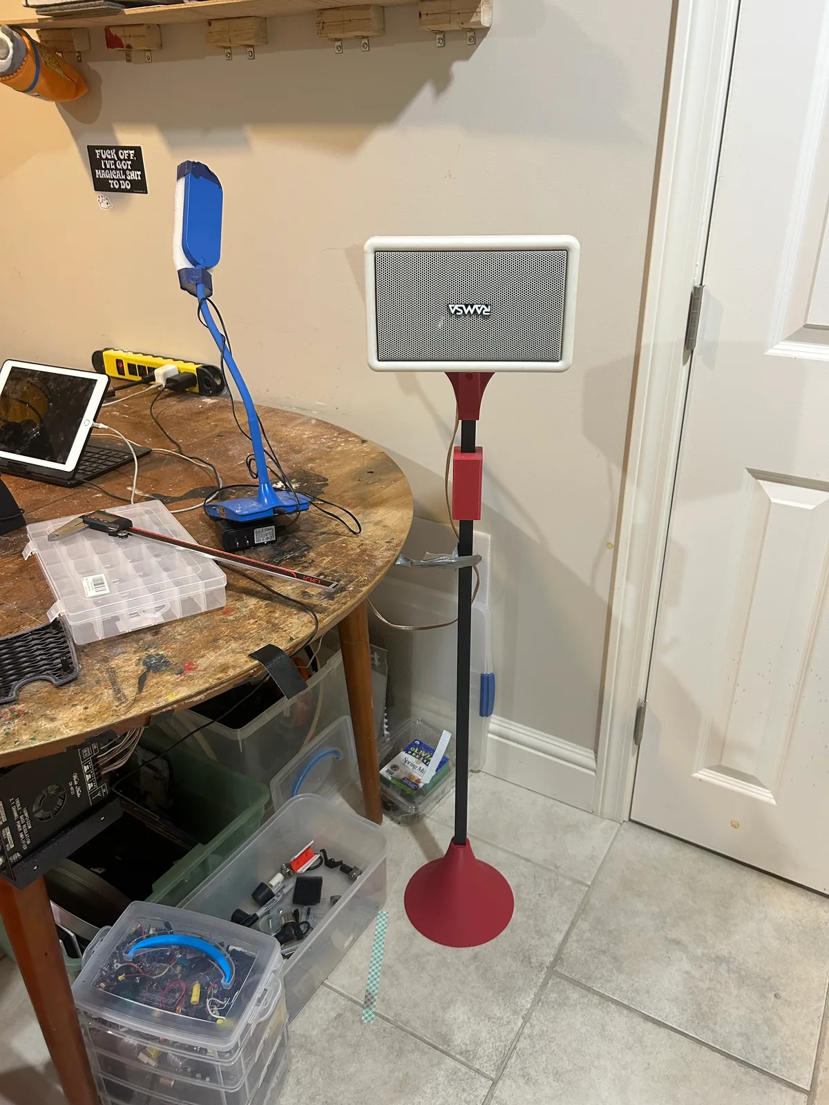 A finished stand next to the workbench