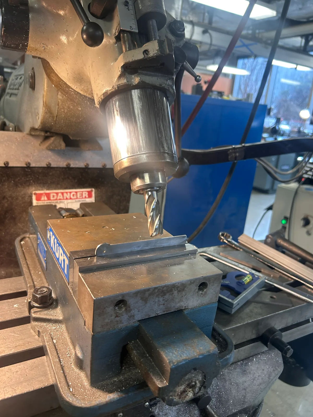 Milling the bevel on a waterjet-cut blade blank.